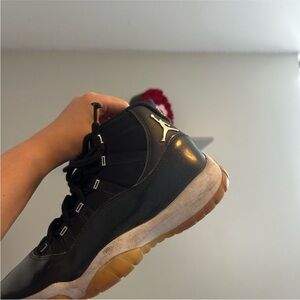 Jordan Women's Black and Gold Shoes
